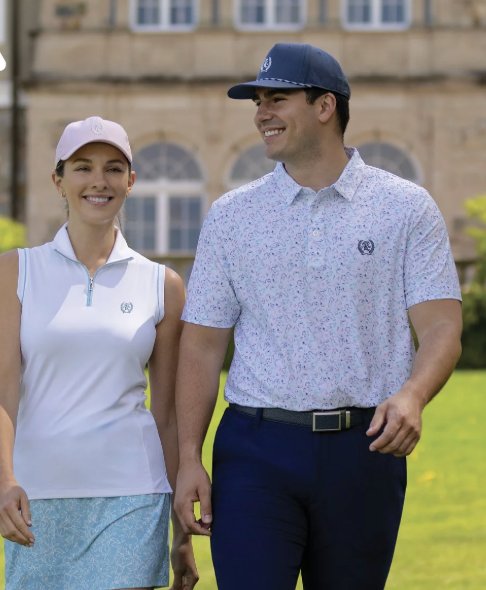 Two golfers wearing Ahead caps on a course